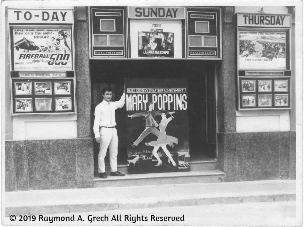 White Light Pictures owner in front of old cinema in Malta